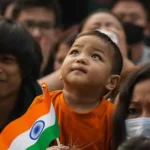 A child with Flag